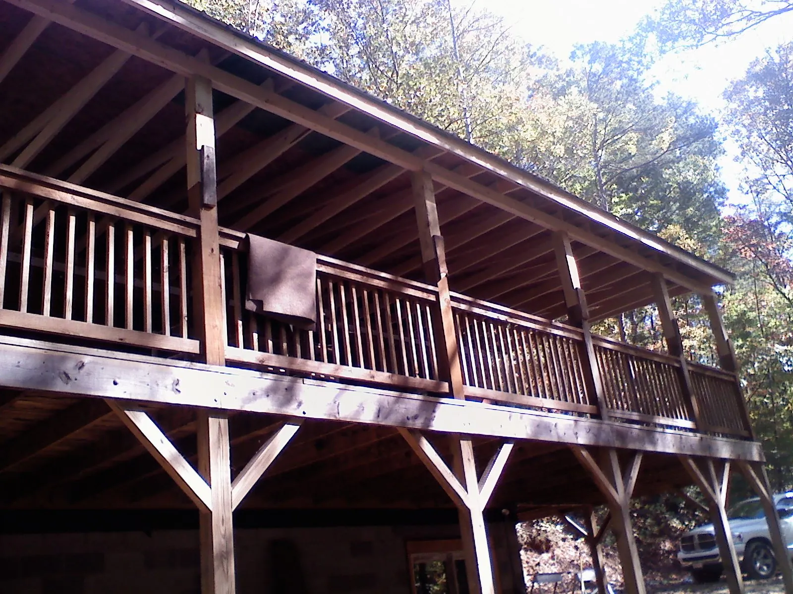 Timber framing under a new elevated porch and deck — Roof Leak Repair in Sweeden by Roofing Brothers